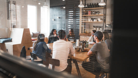 Group of young professionals sitting at a counter in Tacoma